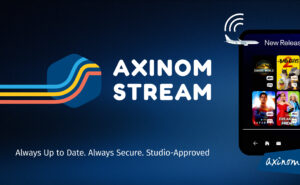 Axinom Stream advertisement on a blue backdrop with the logo, and a tablet displaying IFE content.