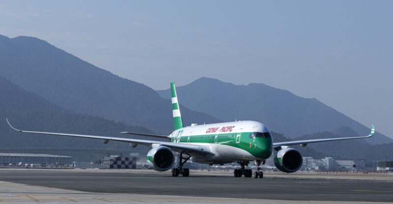 Cathay aircraft with the 80th anniversary livery taking off.