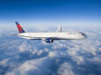 Delta Air Lines Boeing 787 Dreamliner in flight above the clouds.