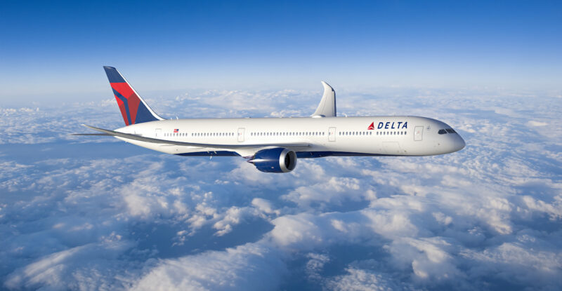 Delta Air Lines Boeing 787 Dreamliner in flight above the clouds.