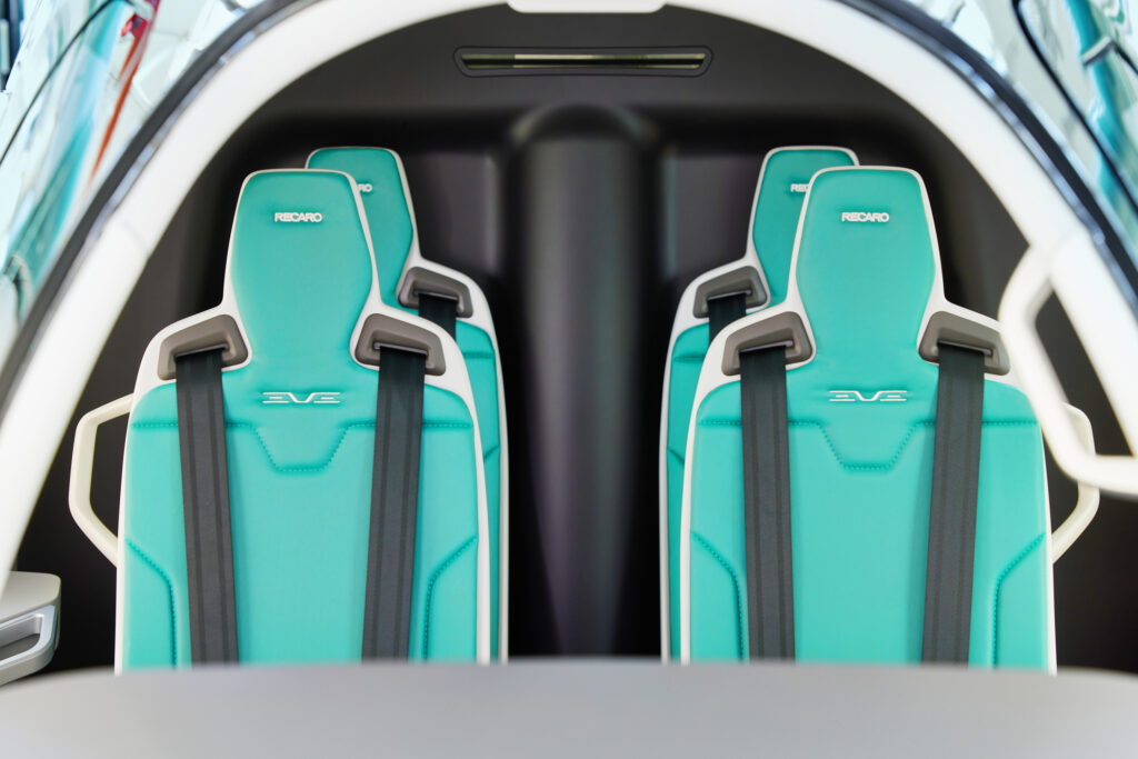 Eve Air Mobility eVTOL interior mockup with Recaro seats.