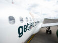 Looking down the side of a GetJet Airlines aircraft.