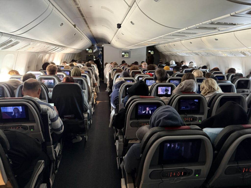 A full American Airlines economy class cabin ready for flight.