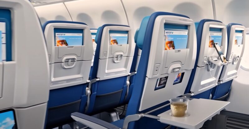 Economy class slimlines on board a WestJet 737 MAX 8. The refitted aircraft features a densified standard economy section.