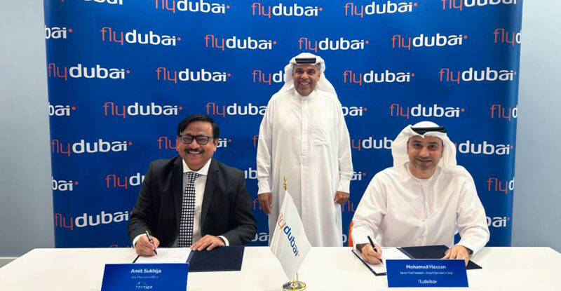 ZestIoT and flydubai executives at the signing of the agreement.