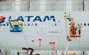 Lufthansa Technik technicians apply AeroSHARK to LATAM 777