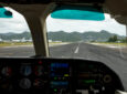 Looking out towards the runway from the cockpit window.