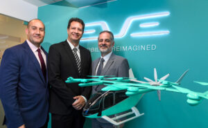 Eve and CAE execs celebrate the FFS deal