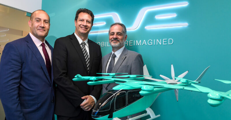 Eve and CAE execs celebrate the FFS deal