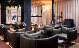 Various comfortable seating options in the Aspire Executive Lounge Copenhagen suite.