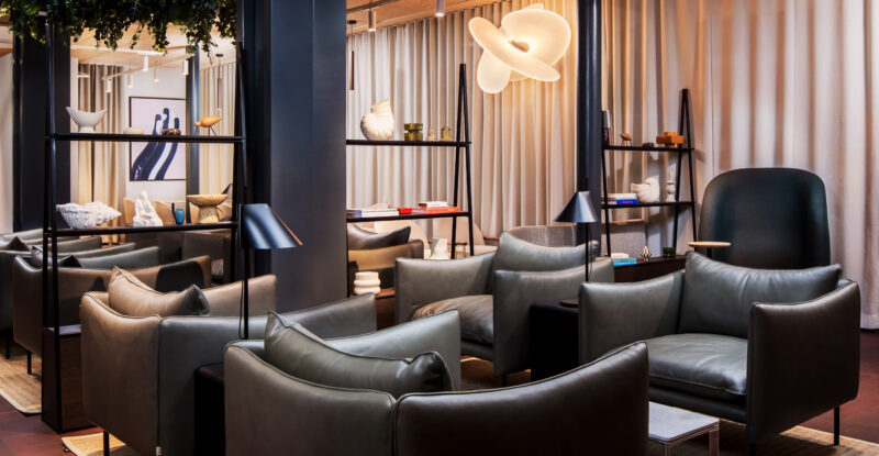 Various comfortable seating options in the Aspire Executive Lounge Copenhagen suite.