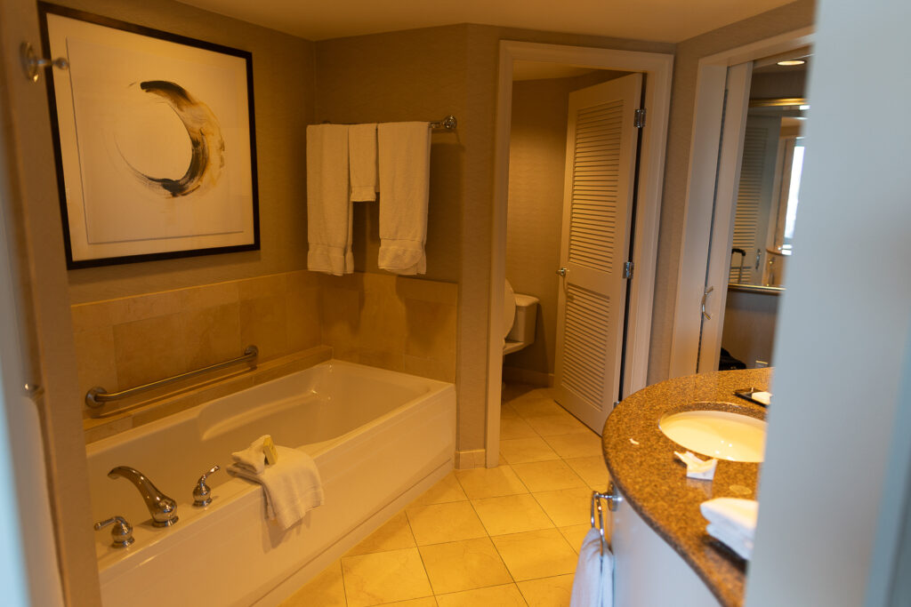 A large soaker tub is pictured here in the hotel bathroom.