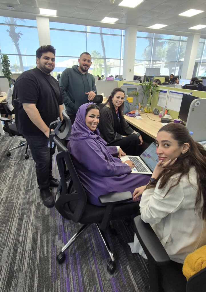 Hazar seated at the back with her marketing colleagues