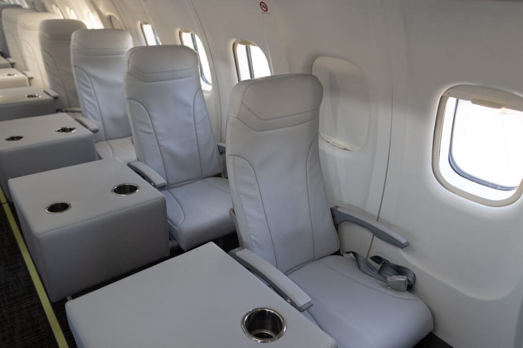 The off-white aircraft single seats on the JSX ATR.