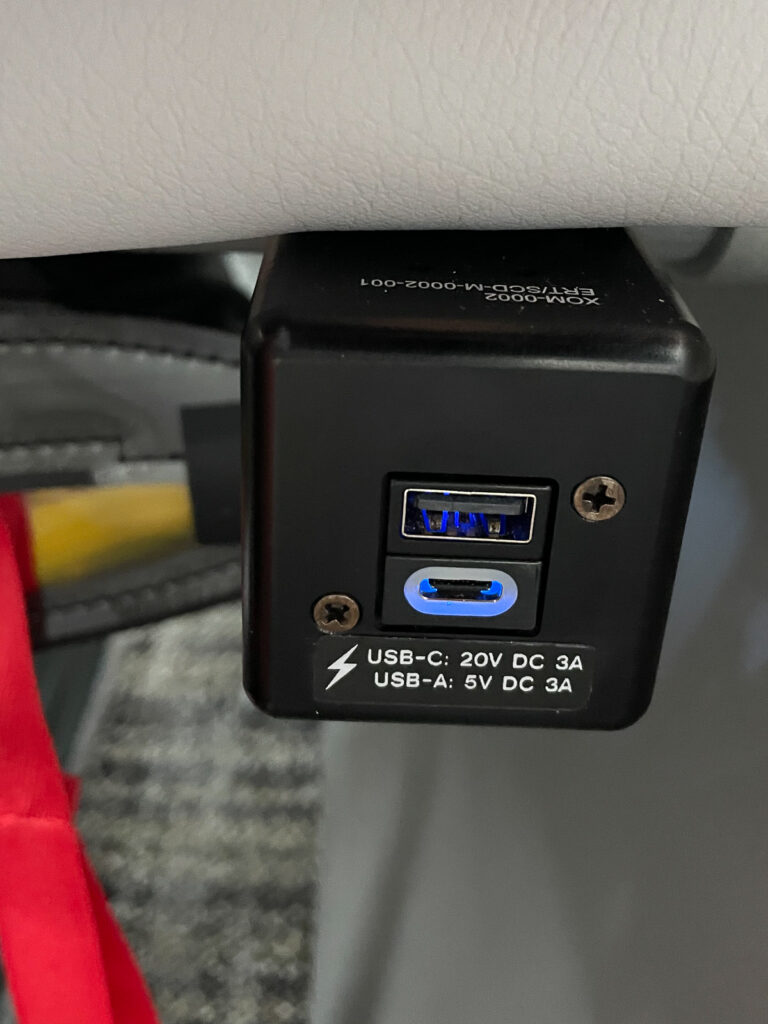 A close up of the in-seat power ports.