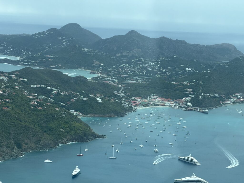 Flying over the ocean and island peaks.
