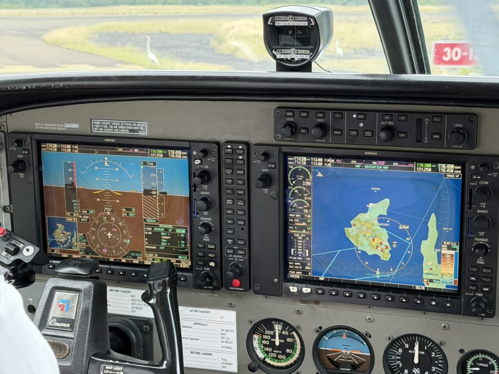 A close up of the cockpit in the Cessna Grand Caravan.