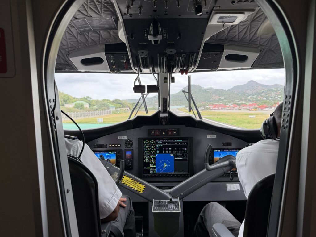 Looking into the cockpit of the Winair Twin Otter.