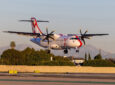 JSX ATR 42-600 landing at an airport.