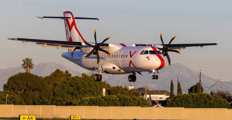 JSX ATR 42-600 landing at an airport.