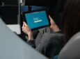 A passenger on Aer Lingus uses the Starlink inflight Wi-Fi on their tablet