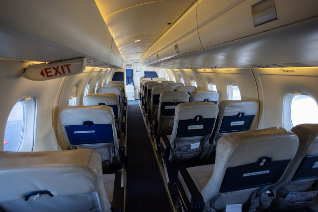 A 1-2 layout is seen inside the Central Mountain Air cabin.