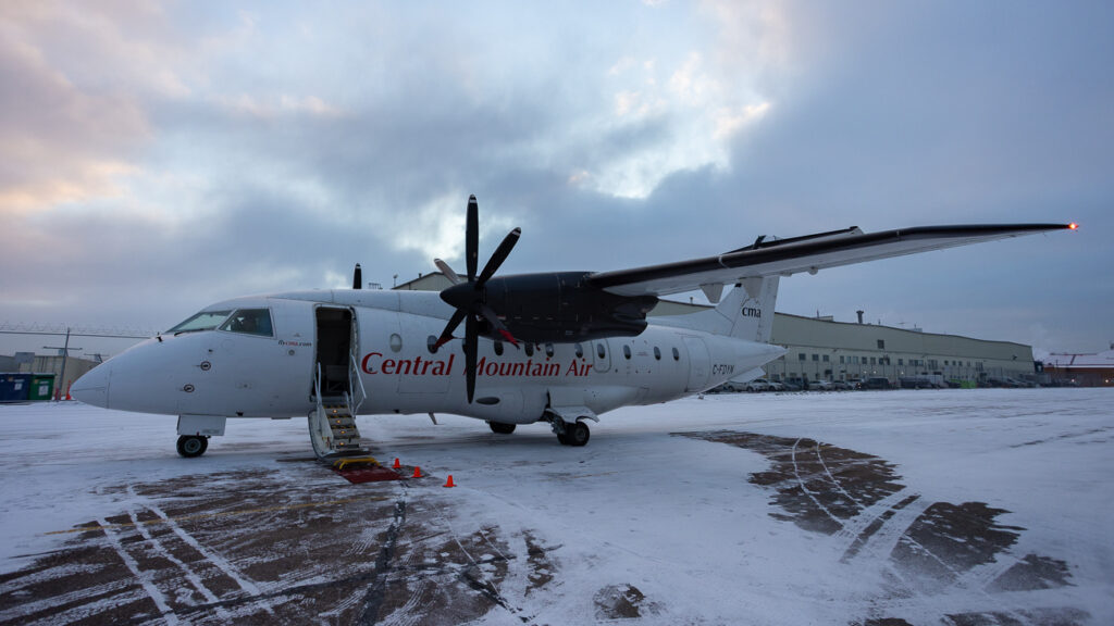 Central Mountain Air (CMA) Dornier 328 turboprop ready for boarding.