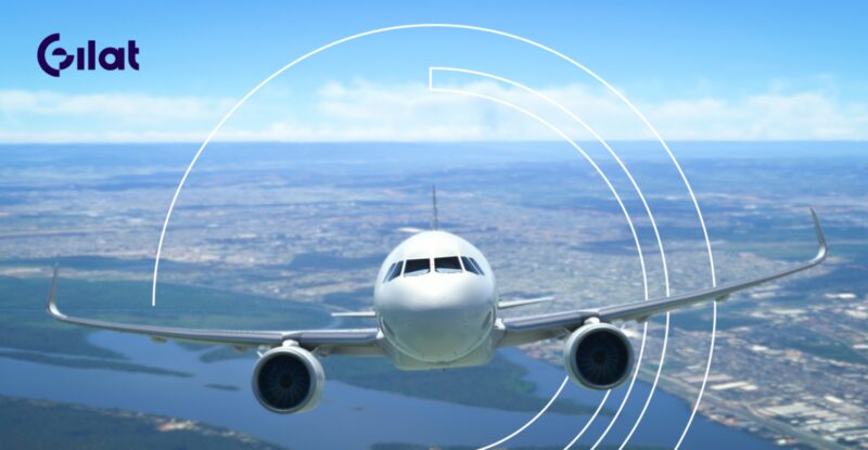 An aircraft flying head on with the Gilat logo in the top left corner.