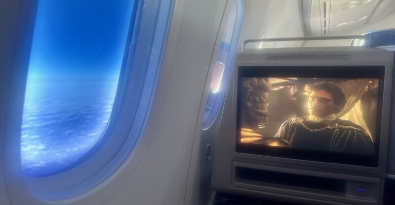 Gladiator plays on the IFE screen in this window seat aboard the 787