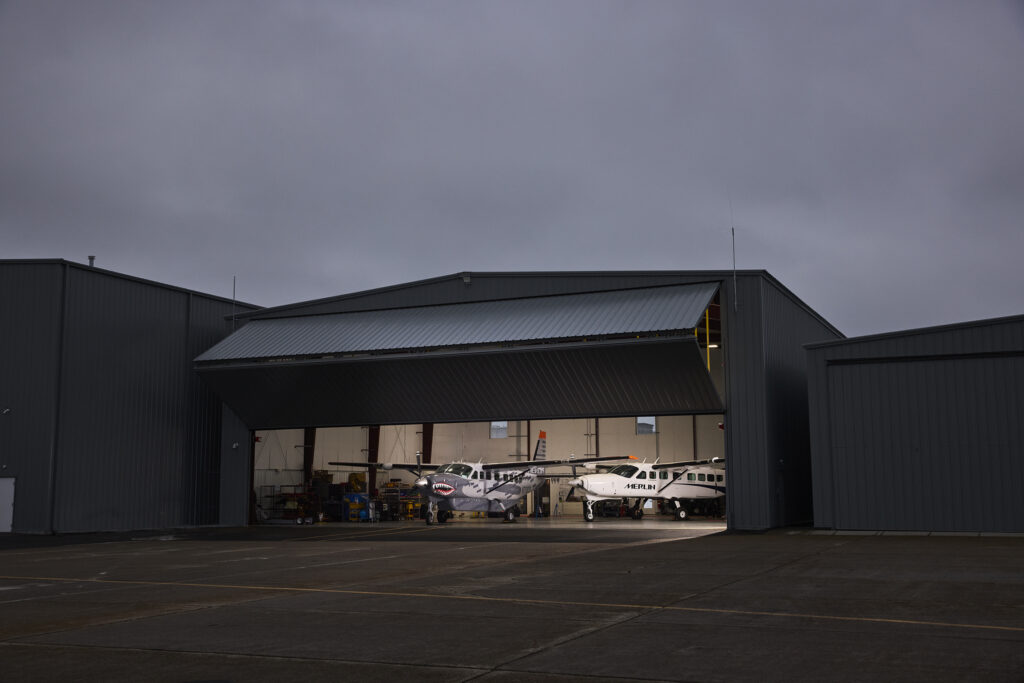 Merlin Labs hangar at night.