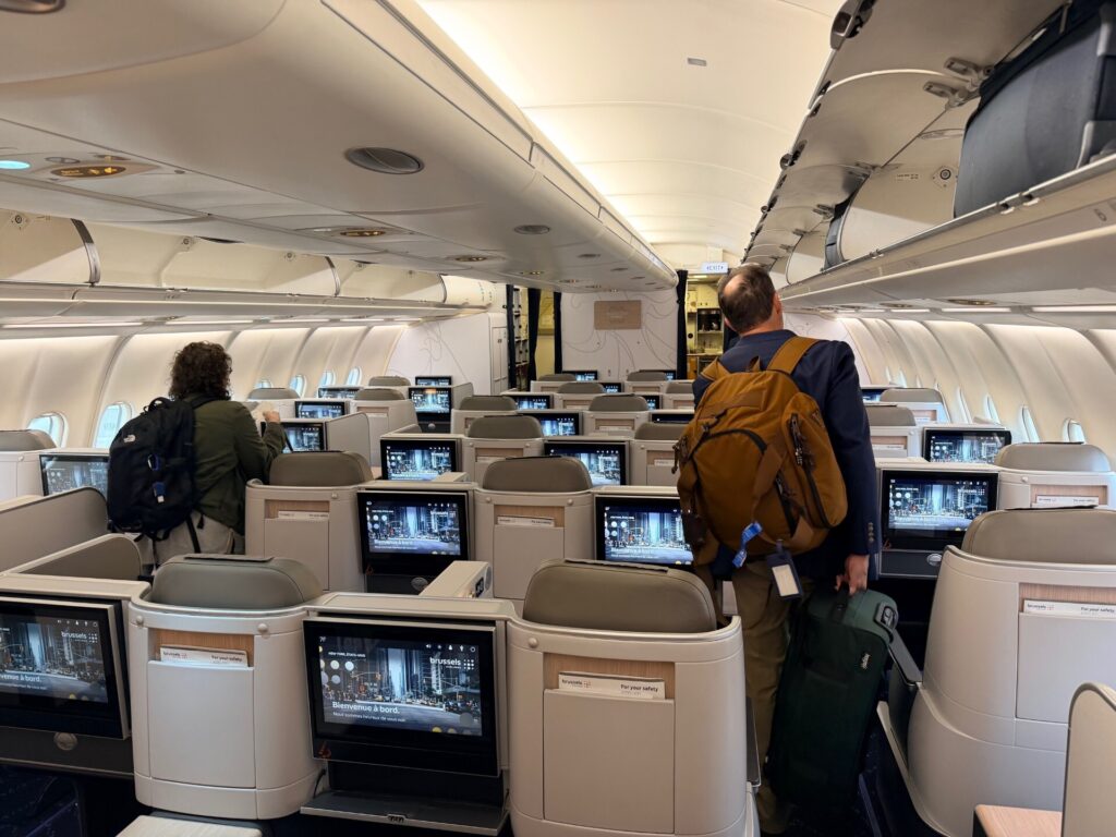 The Brussels Airlines A330-300 cabin is slowly being boarded.