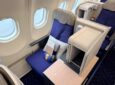 Brussels Airlines business class seat in blue with grey accents.