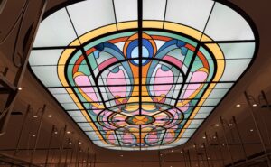 A beautiful stained-glass lighting panel in The View lounge at Brussels Airport.