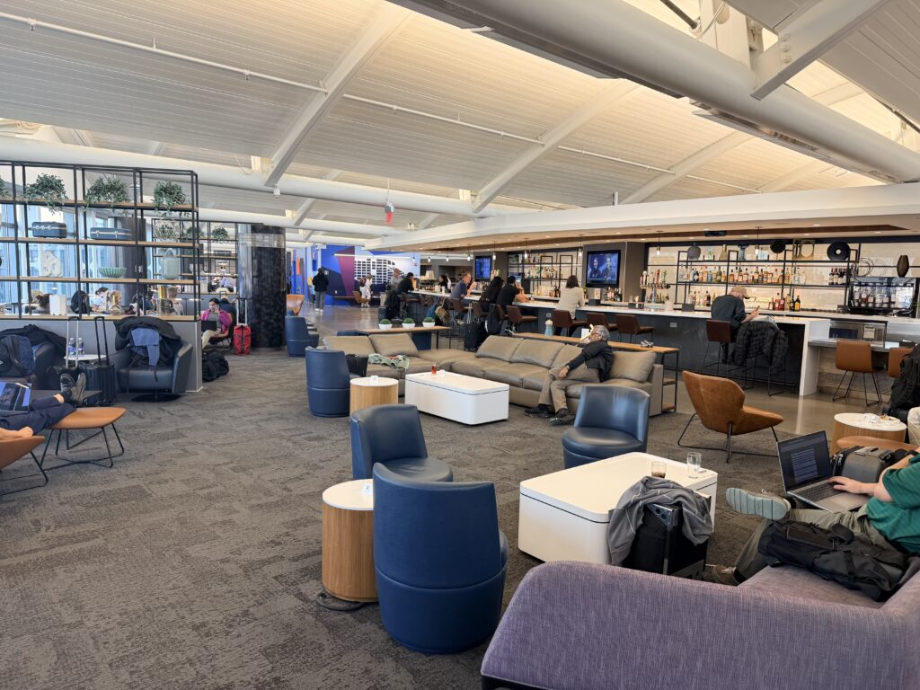 The United Club lounge is a vast open spacious with various forms of seating.