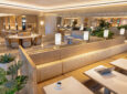 Korean Air LAX Prestige Class Lounge features long sofas, and a variety of different chairs and tables.