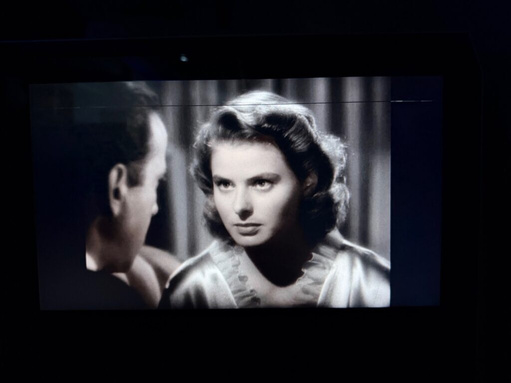 The IFE screen is playing a movie.