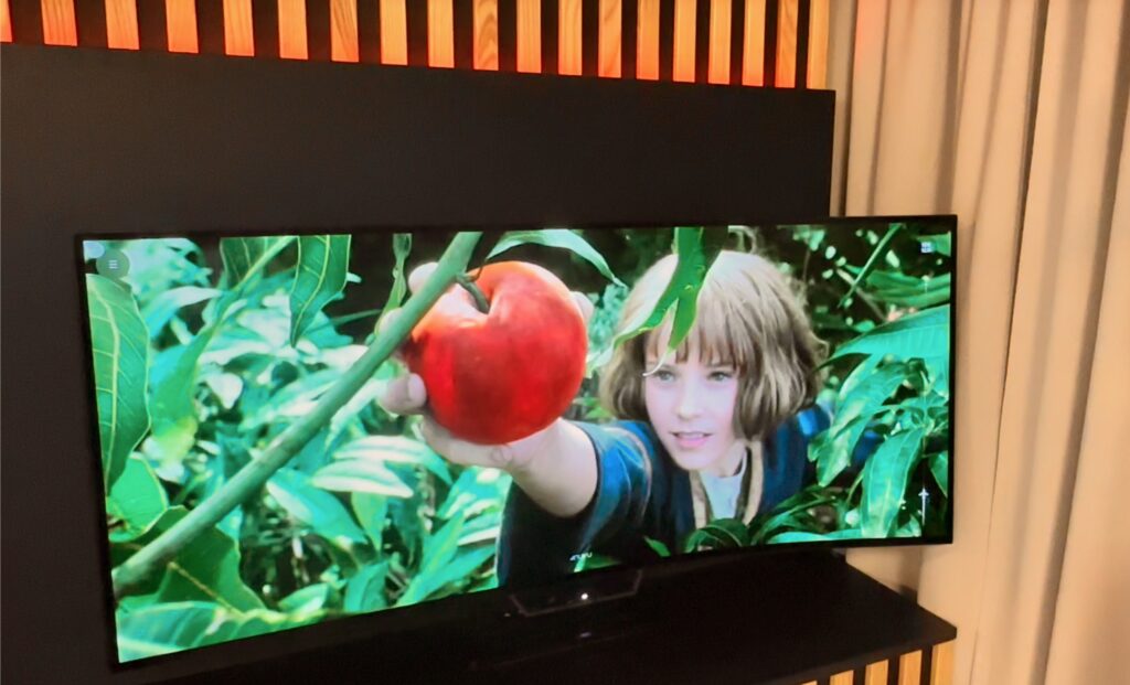 Furiosa grabs a red apple in the movie; the scene is highly immersive on Astrova Curve