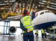 British Airways technician waves at the pilot of the Starlink-fitted 787