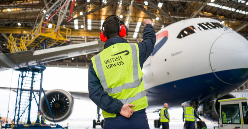 British Airways technician waves at the pilot of the Starlink-fitted 787
