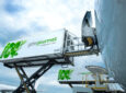 gategroup catering items are being loaded onto an aircraft.
