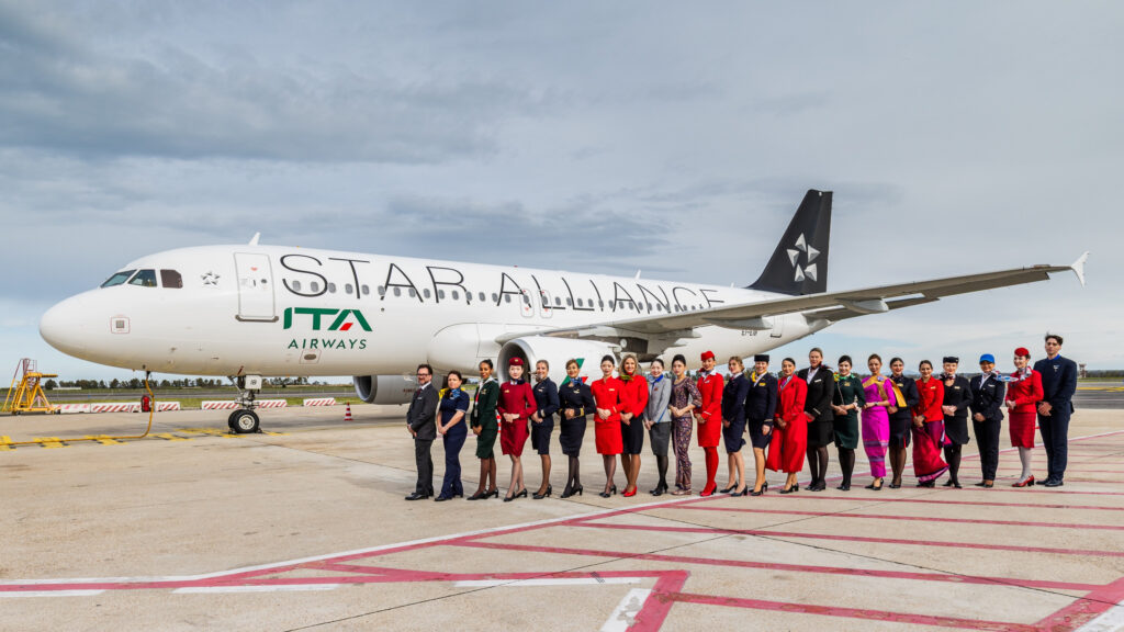 ITA Airways and Star Alliance employees in front of the aircraft.