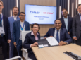Thales and Air India executives signing the agreement at AIX 2026