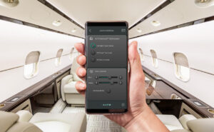 A mobile device is being held up in a bizjet aircraft. It is displaying the ALTO MySound app.