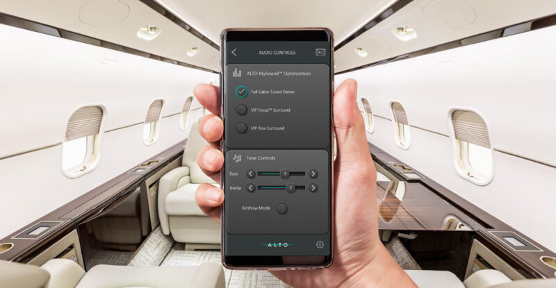 A mobile device is being held up in a bizjet aircraft. It is displaying the ALTO MySound app.
