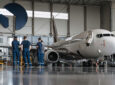 FL Technics Group's aviation maintenance hangar with an aircraft being tended to.