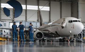 FL Technics Group's aviation maintenance hangar with an aircraft being tended to.