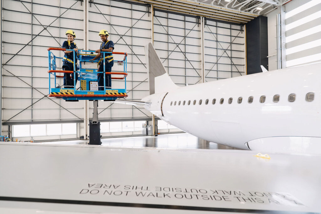 FL Technics Group's aviation maintenance hangar with an aircraft being tended to.