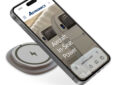 A mobile device is charging using the EmPower Qi21 Wireless Charging Module.