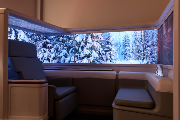 Wrap around micro-LED screen provides deeply immersive premium travel experience
