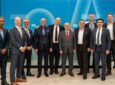 Executives from Viasat Aviation, Türksat and SkyFive Arabia stand for a photo together.